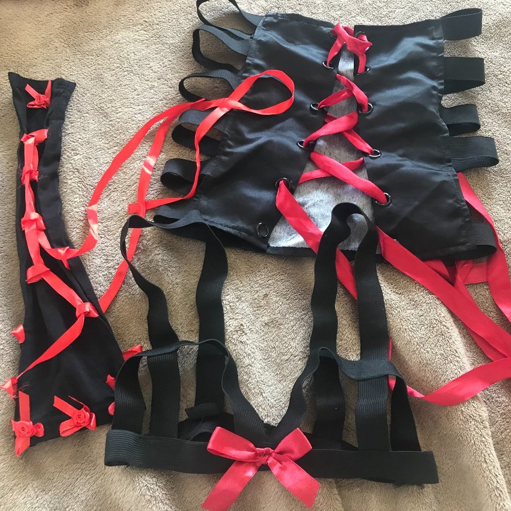 Loose grommets strappy vampiric black and red lingerie or costume